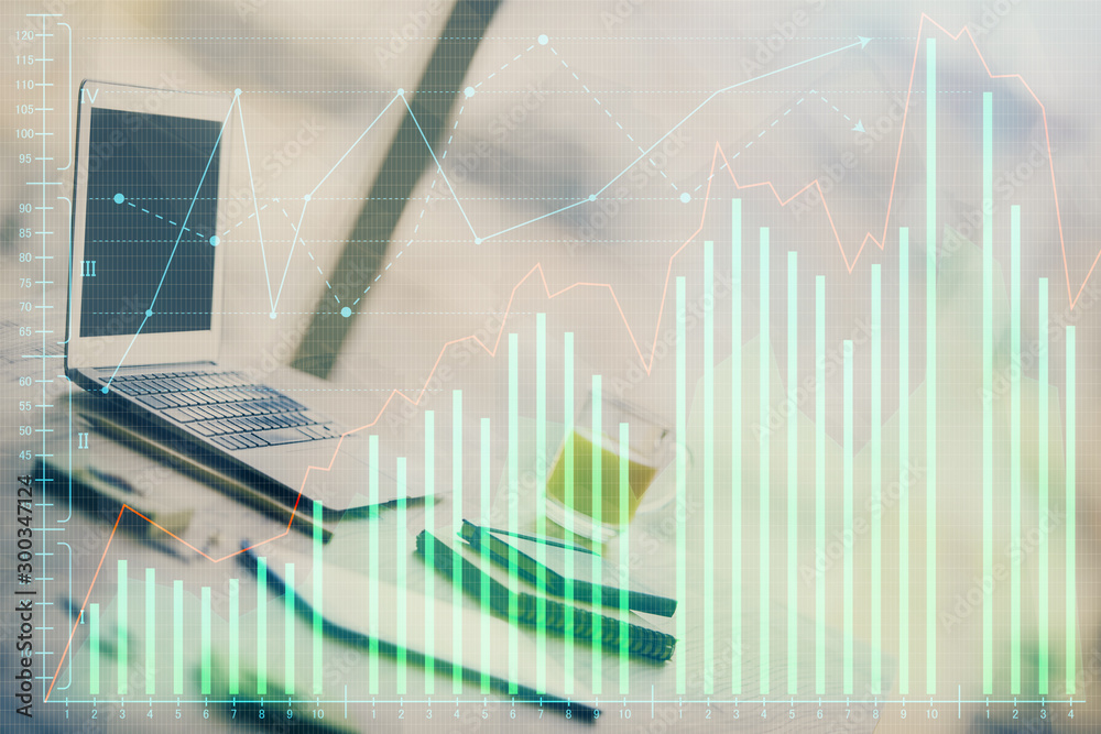 Forex market graph hologram and personal computer on background. Double exposure. Concept of investment. Forex market graph hologram and personal computer on background. Double exposure. Concept of investment.
