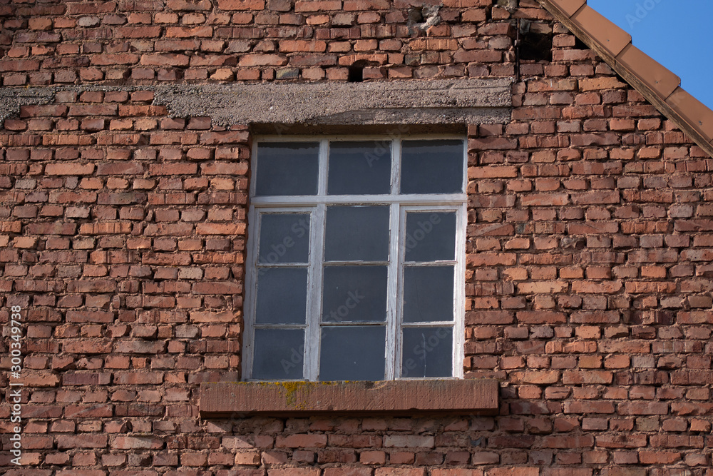 Detail of brick wall building , old window