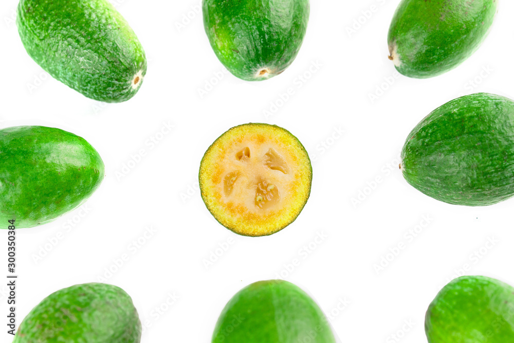 Juicy and ripe feijoa isolated on a white background. Healthy autumn fruit. Juicy and ripe feijoa isolated on a white background. Healthy autumn fruit.