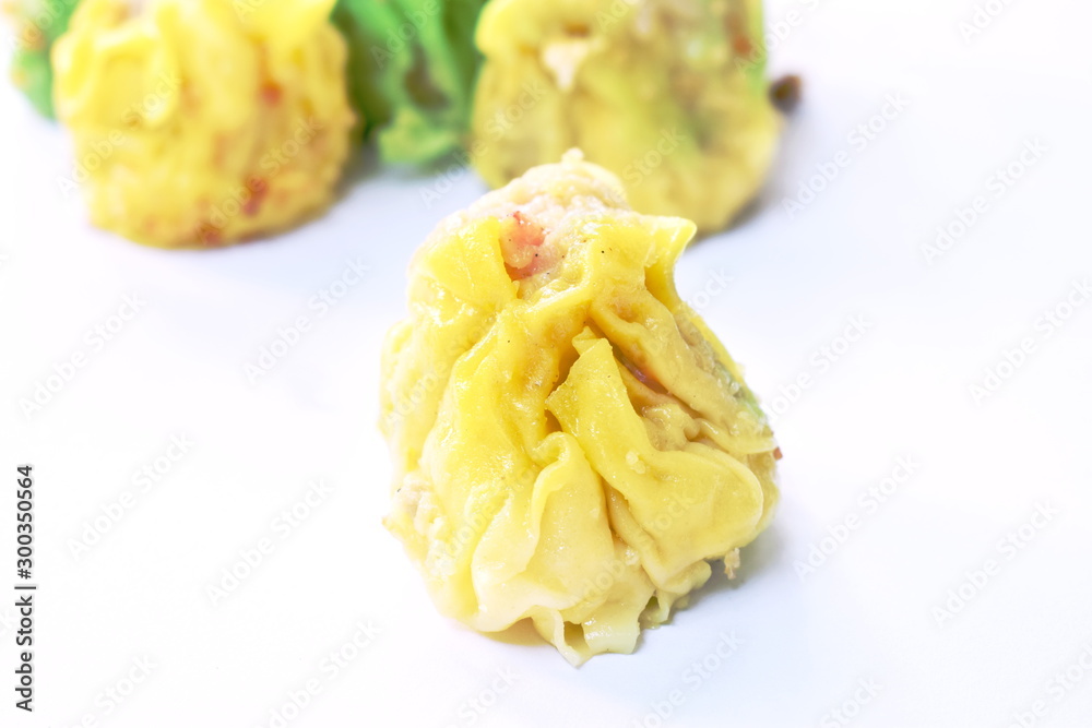 steamed Chinese dumpling filling minced pork or dim sum on white background steamed Chinese dumpling filling minced pork or dim sum on white background