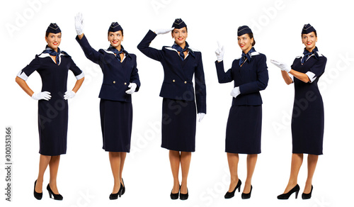 Young beautiful Russian stewardess in blue uniform photo