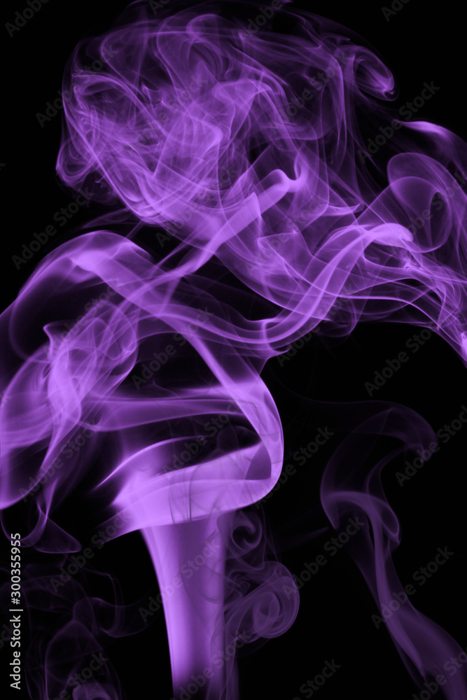Fototapeta premium creative idea for background. lilac smoke on a black background