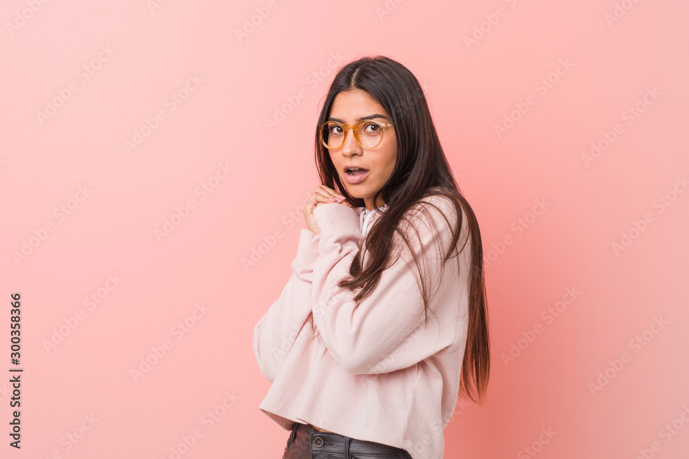 Young pretty arab woman wearing a casual sport look scared and afraid. Young pretty arab woman wearing a casual sport look scared and afraid.