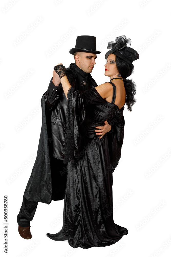 Cute couple dressed in vampire style clothes Cute couple dressed in vampire style clothes
