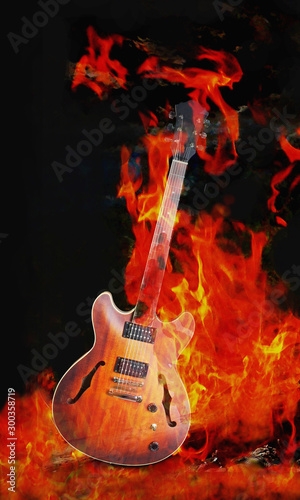 Fototapeta Naklejka Na Ścianę i Meble -  Electric guitar on fire on a dark background.