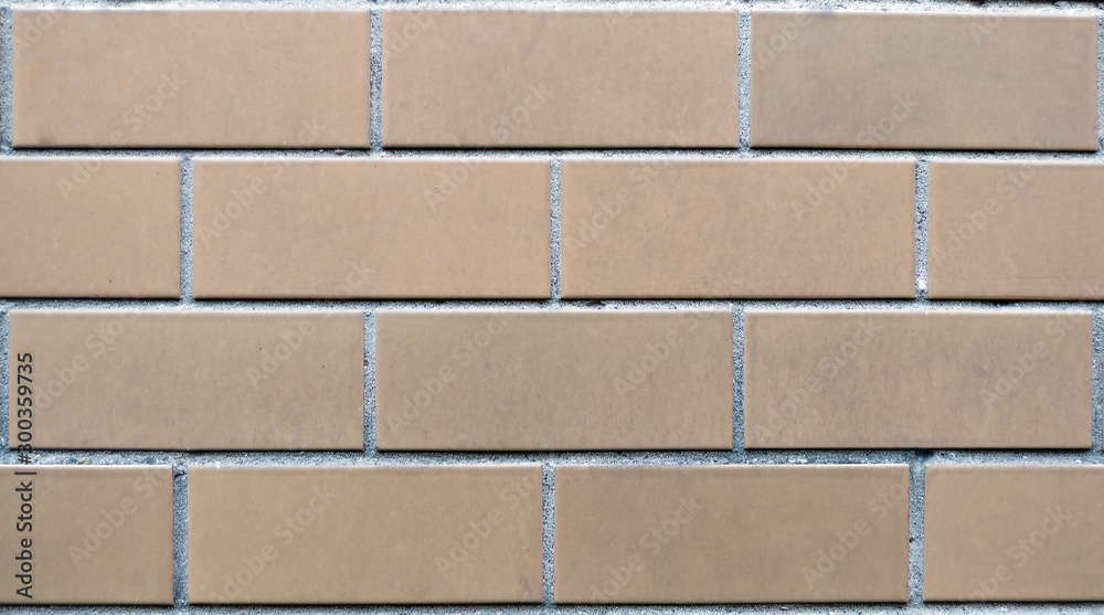 Naklejka premium background section of brick wall dark red close-up