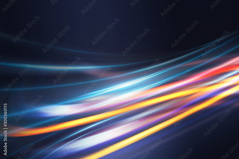 Multicolored blurred lines on a dark abstract background, neon glow