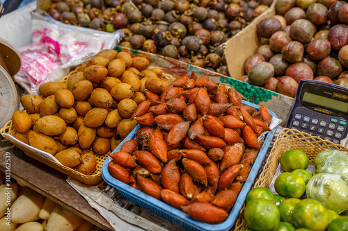 Traditional asian food market in Thailand, exotic fruits