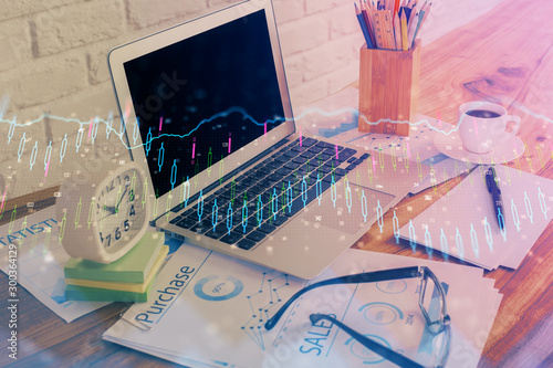 Double exposure of forex chart and work space with computer. Concept of international online trading. © peshkova