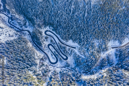 Mountain winter road, aerial view