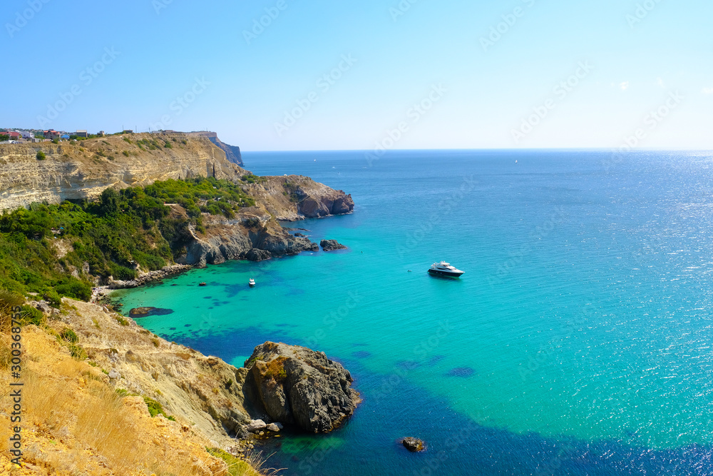 Beautiful azure sea and rocky cliffs. Black sea, Crimea. 