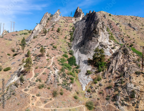 Ominous sandstone rock outcroppings in a desert like atmosphere at the Peshastin Pinnacles State Park in Chelan County Washington photo