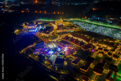 Aerial view of Legend Siam with symphony light show at night, Pattaya Thailand. Select focus.