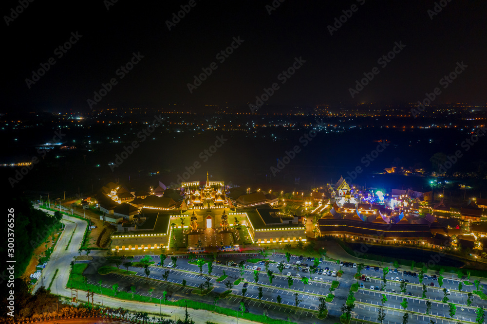Aerial view of Legend Siam with symphony light show at night, Pattaya Thailand. Select focus.