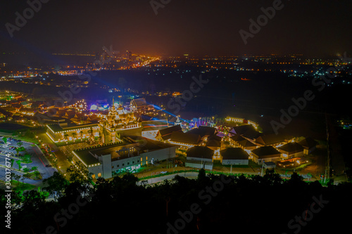 Aerial view of Legend Siam with symphony light show at night  Pattaya Thailand. Select focus.