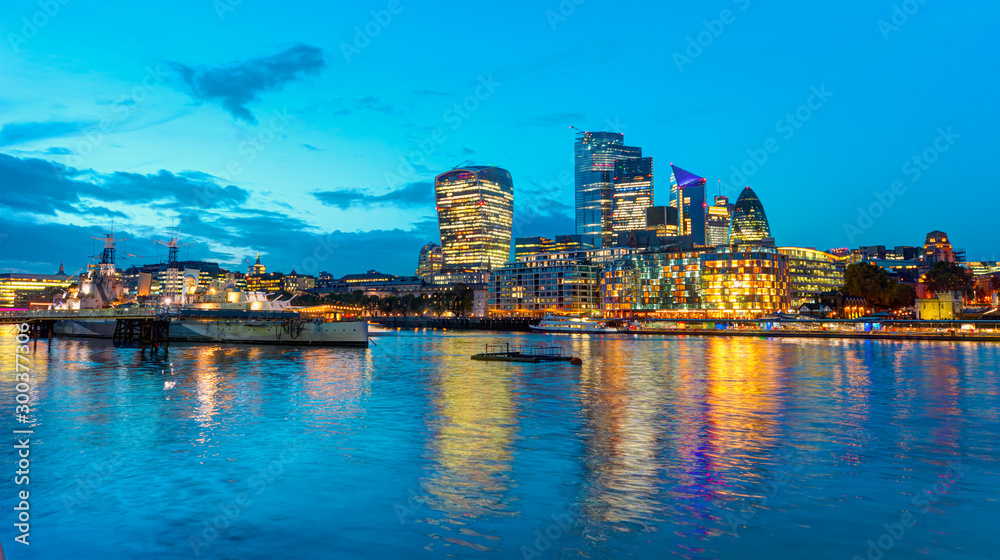 Panorama of the modern skyline on Thames river at twilight blue hour   - London, United Kingdom