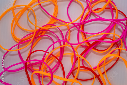 Lot of entangled bright and colorful rubber bands