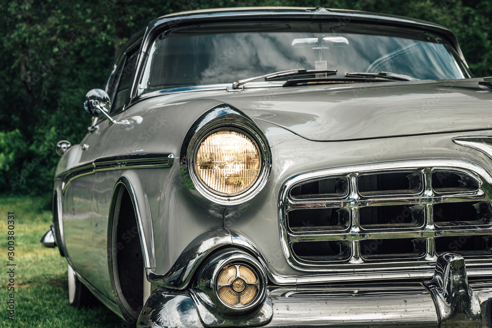 Classic car from the early fifties with large chromed grille