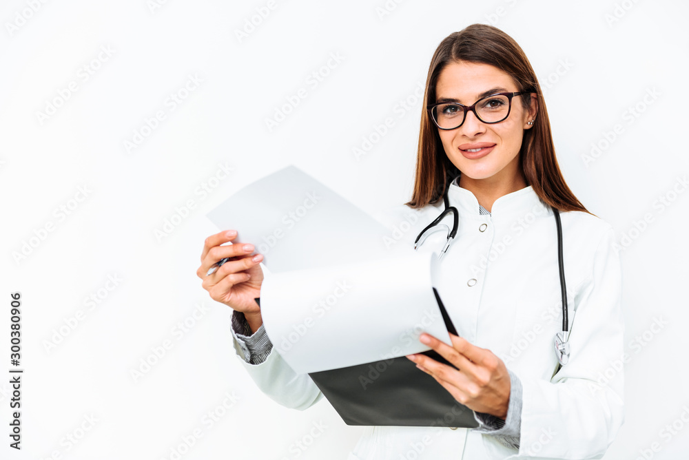 Beautiful female doctor smiling isolated on white background Beautiful female doctor smiling isolated on white background