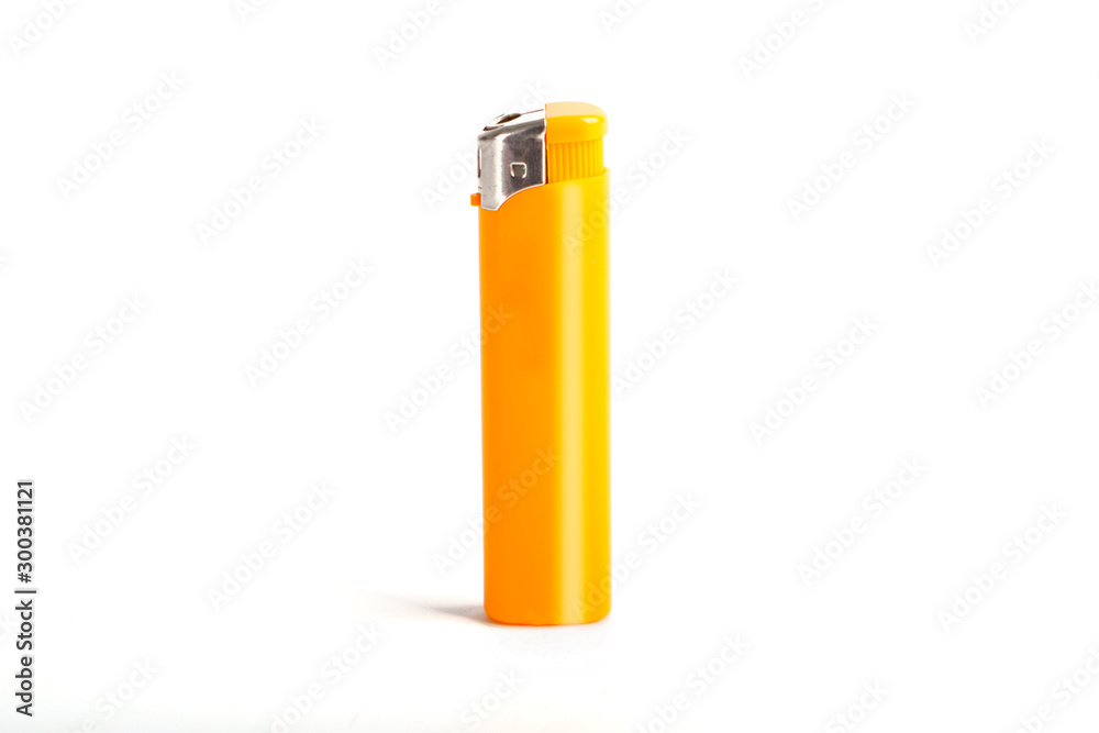 Yellow cigarette lighter isolated on a white Yellow cigarette lighter isolated on a white