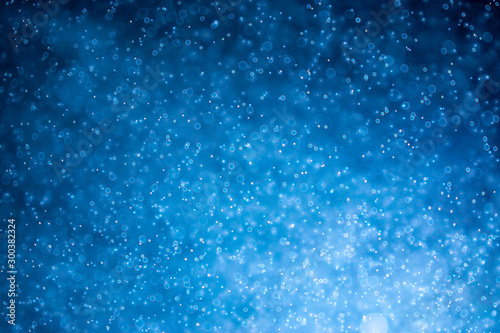 Abstract Blue bokeh background.  Christmas and winter concept.