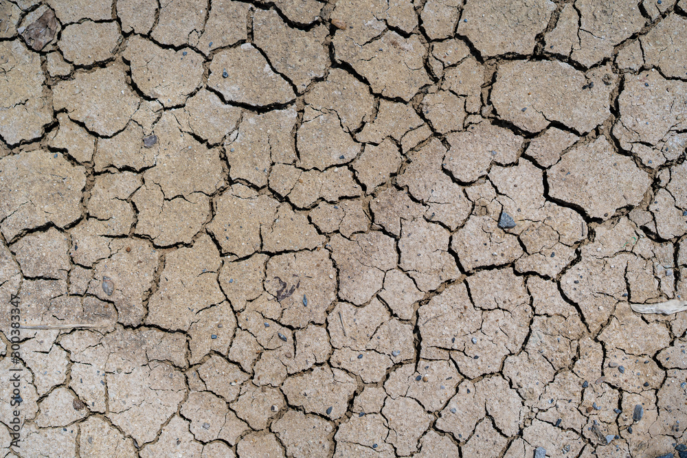 Beautiful texture of cracked dry ground in the countryside background. Beautiful texture of cracked dry ground in the countryside background.