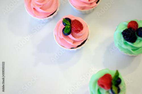 top view cupcakes with frosting isolated on white