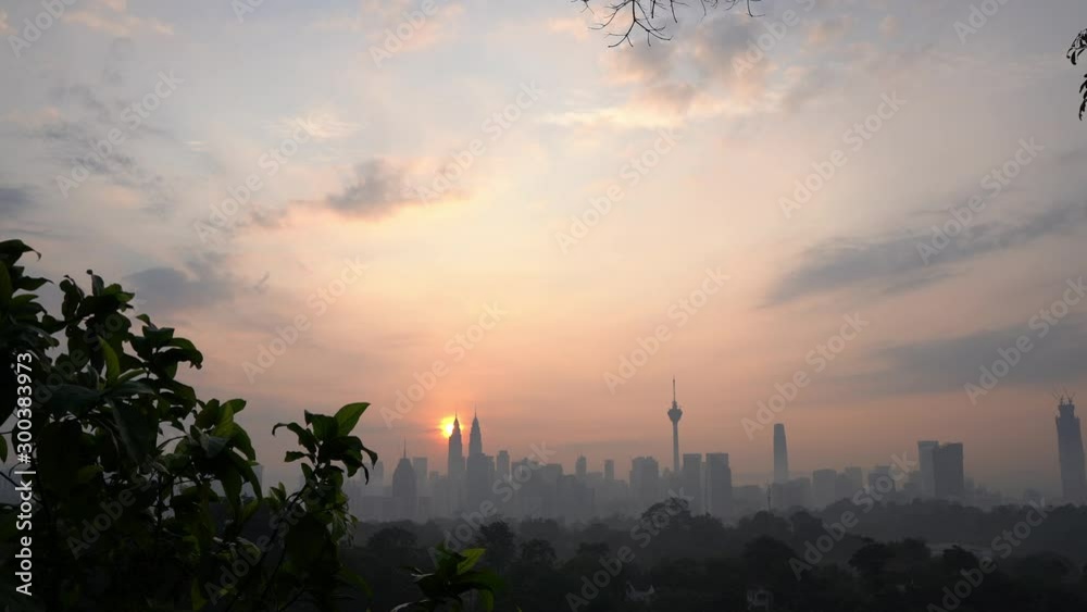 4k establishing cinematic b-roll shot of sunrise at Kuala Lumpur city skyline. 4k establishing cinematic b-roll shot of sunrise at Kuala Lumpur city skyline.