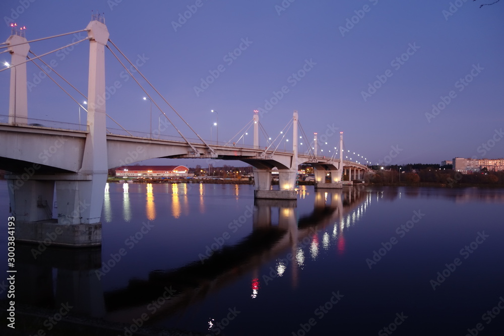 Bridge over river Volga at Kimry in Russia in autumn with lights