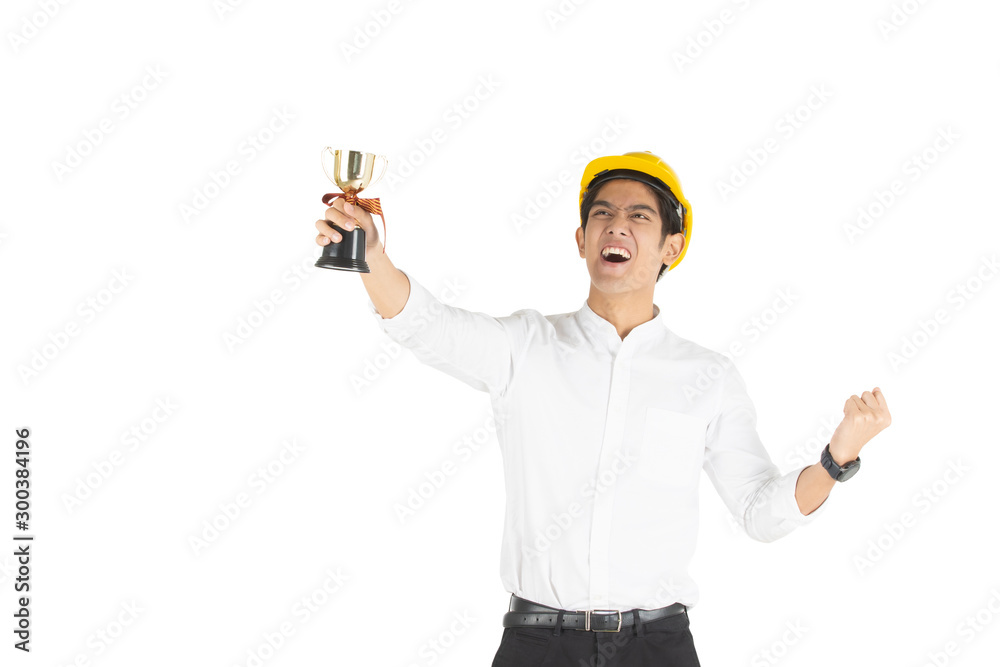Smart and handsome cheerful Asian businessman holding the golden champion cup close up, isolated on white background with clipping path. Businessman portrait. Smart and handsome cheerful Asian businessman holding the golden champion cup close up, isolated on white background with clipping path. Businessman portrait.