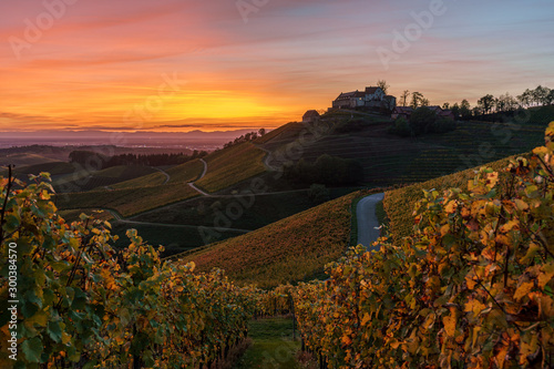 Castle Staufenberg in Durbach Germany in the BlackForest Mountains with a vineyard and an old chapel during sunset at golden hour	