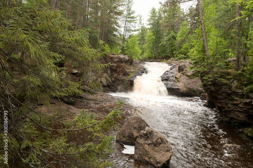 Amnicon State Park waterfall and river flowing through the forest