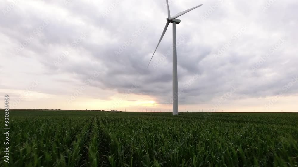 Wide aerial, wind turbine on farmland Wide aerial, wind turbine on farmland