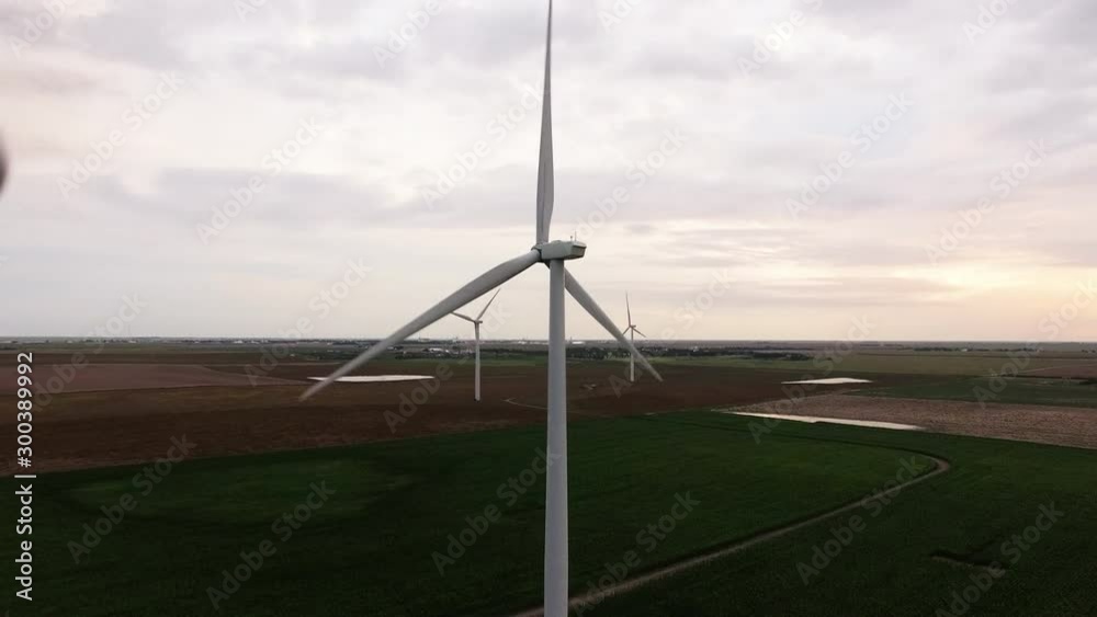 Panning aerial, wind turbines in rural landscape Panning aerial, wind turbines in rural landscape