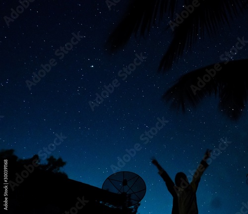 girl reach Star in the night