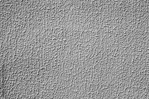 Abstract rough texture and background of wet plastered cement wall on grungy surface of gray concrete