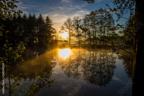 Sonnenaufgang am Teich