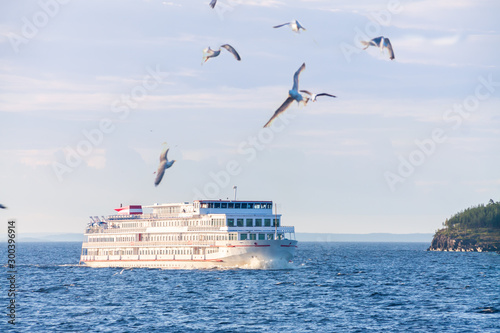 cruise ship touristy blue water travel gull escort