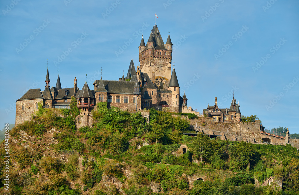 Beautiful Reichsburg castle on a hill in Cochem town, Germany