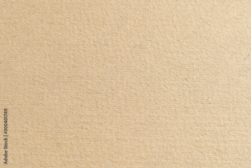 Closeup brown sheet of craft cardboard paper texture background Closeup brown sheet of craft cardboard paper texture background
