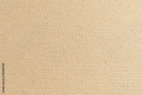 Closeup brown sheet of craft cardboard paper texture background