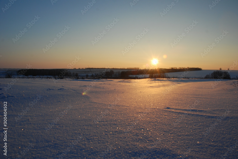 sparkling snow in the sunset