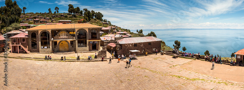 Panoramic view of the main square of Taquile Island at a sunny day in Puno region, Peru photo