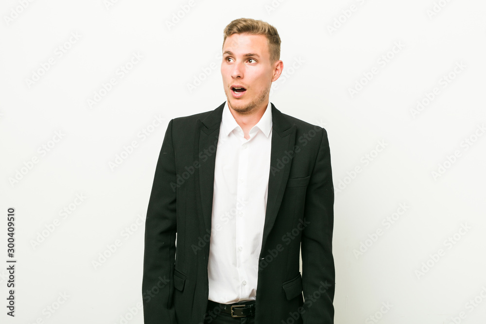 Young caucasian business man being shocked because of something she has seen. Young caucasian business man being shocked because of something she has seen.