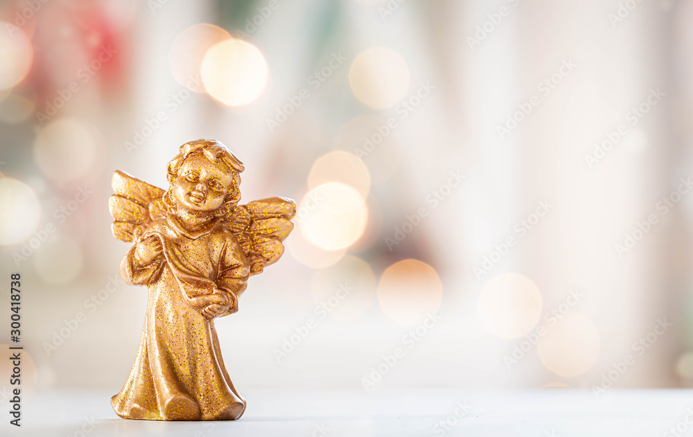Fototapeta premium golden Christmas Angel, white Background with Lights