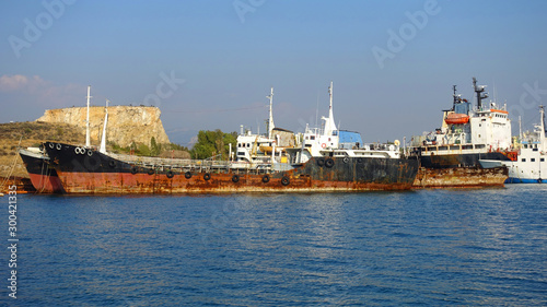 Old abandoned shipyard with scrap boats left to rust