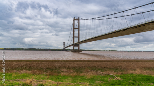 Grey clouds over the Humber Bridge  seen from Barton-Upon-Humber in North Lincolnshire  England  UK