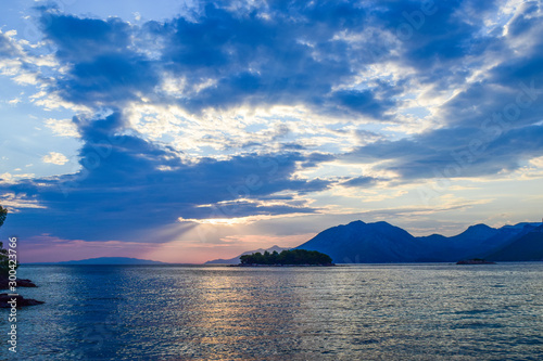 Crepuscular rays over the sea.