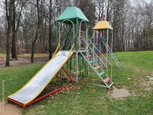 empty slider in children playground in park