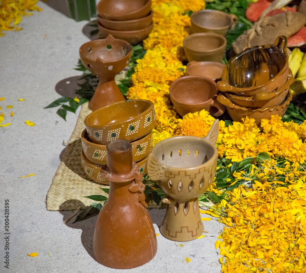 Fototapeta premium Mixtec traditional offering, clay pottery, flowers, day of the dead Mexico